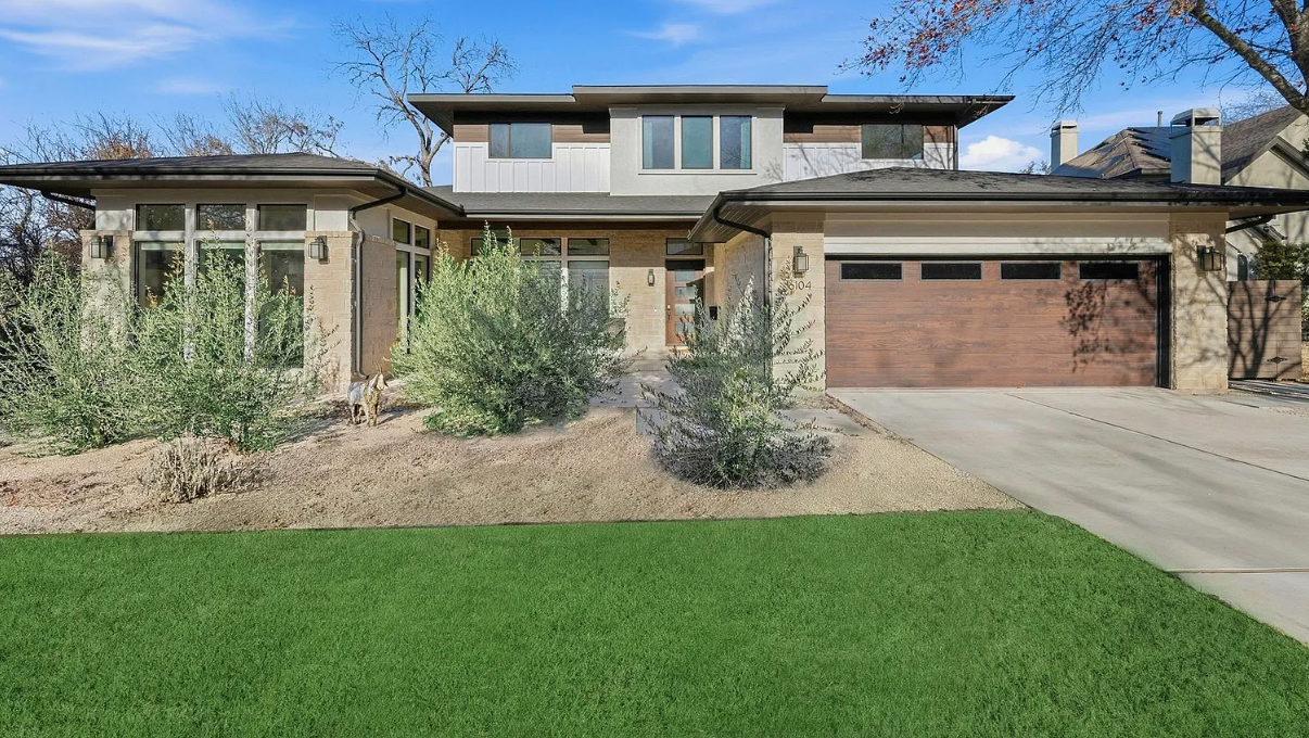 Landscaping design project — modern home with native plantings and manicured lawn
